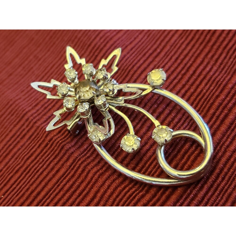 Vintage Unsigned White Rhinestone Star Over Oval Silver Color Brooch